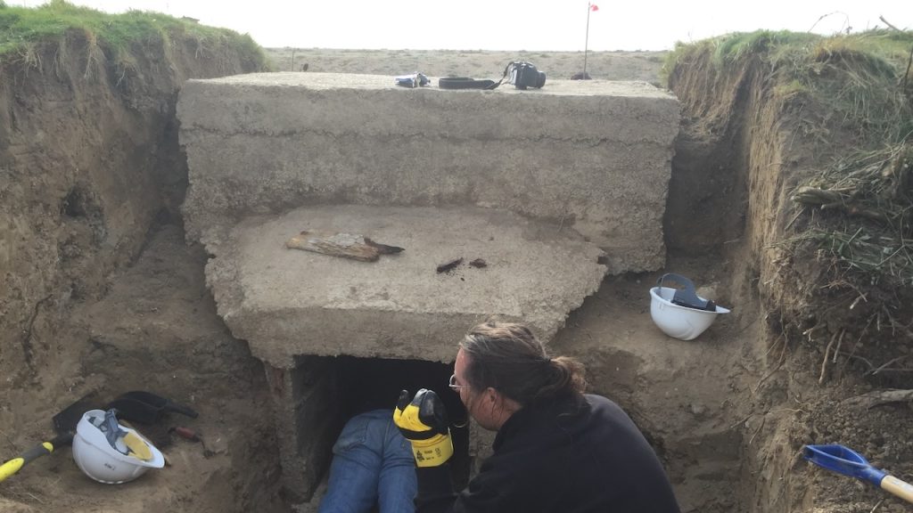SMHS members excavating a pillbox at Cuckmere Haven